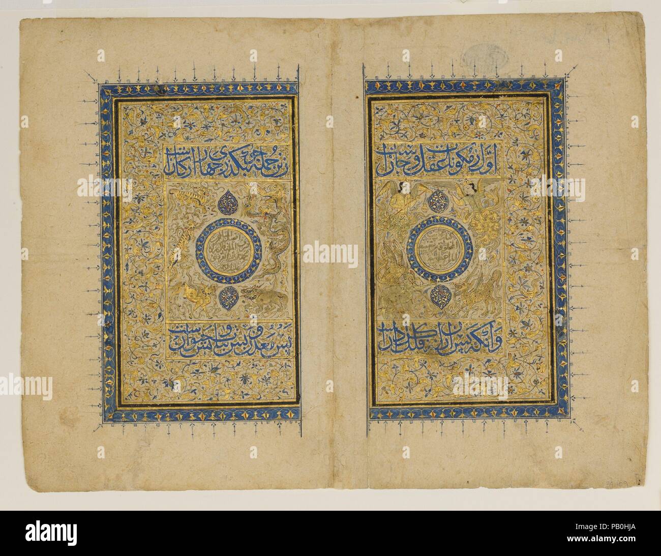 Double Title Page from a `Aja'ib al-Makhluqat wa Ghara'ib al-Mawjudat (The Wonders of Creation and the Oddities of Existence). Author: Zakaria bin Muhammad bin Mahmud Abu Yahya Qazwini (ca. 1203-83). Dimensions: Ht. 11 3/4 in. (29.8 cm)  W. 8 7/8 in. (22.5 cm). Date: 1414-35.  The Marvels of Creation contained information on various aspects of the heavens, the earth and its minerals, plants, birds and animals, as well as unusual phenomena and imaginary creatures. A rukh (roc) or 'anqa (fabulous bird) attacking an elephant and a karkadann (rhinoceros) can be seen to the right of each medallion, Stock Photo